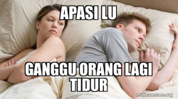 Couple thinking in bed