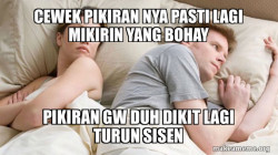 Couple thinking in bed