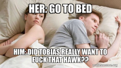 Couple thinking in bed