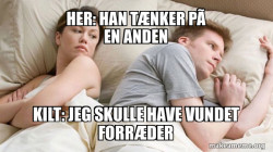 Couple thinking in bed