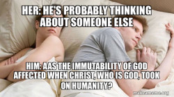 Couple thinking in bed
