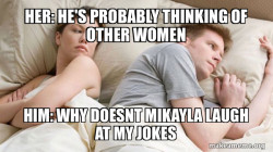 Couple thinking in bed