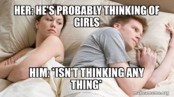 Couple thinking in bed