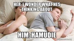 Couple thinking in bed