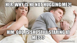Couple thinking in bed