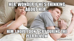Couple thinking in bed