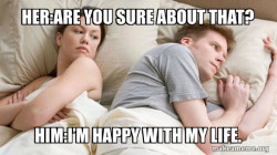 Couple thinking in bed