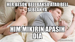 Couple thinking in bed