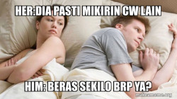 Couple thinking in bed