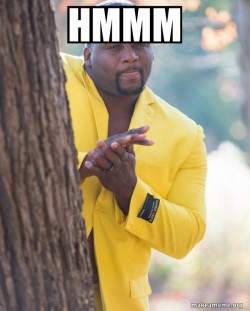 Anthony Adams in Yellow Suit Rubbing Hands