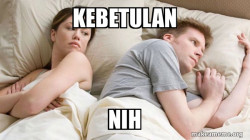 Couple thinking in bed