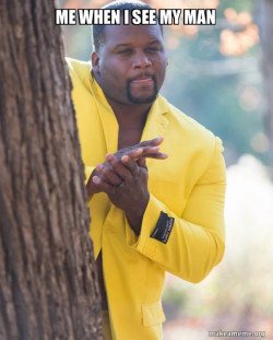 Anthony Adams in Yellow Suit Rubbing Hands