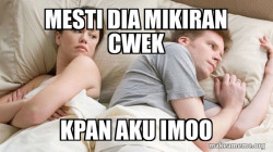 Couple thinking in bed