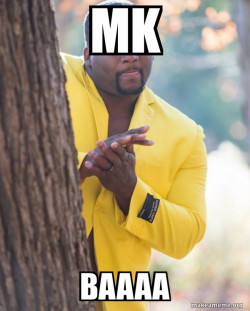 Anthony Adams in Yellow Suit Rubbing Hands