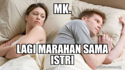 Couple thinking in bed