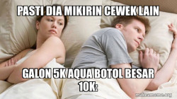 Couple thinking in bed