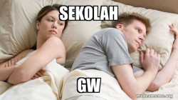 Couple thinking in bed