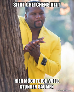 Anthony Adams in Yellow Suit Rubbing Hands