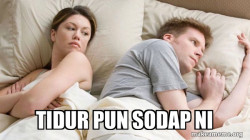 Couple thinking in bed