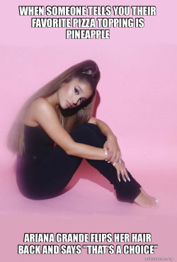 Ariana flips her hair back 