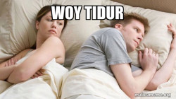 Couple thinking in bed